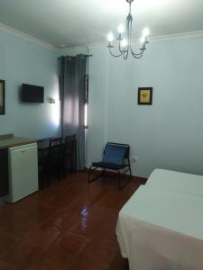 Cama o camas de una habitación en Apartamentos Turisticos Casa Cantillo