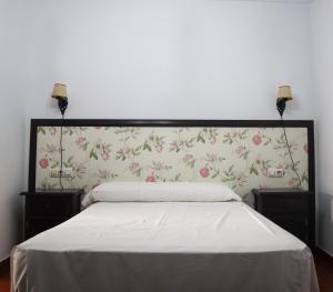 Cama o camas de una habitación en Apartamentos Turisticos Casa Cantillo