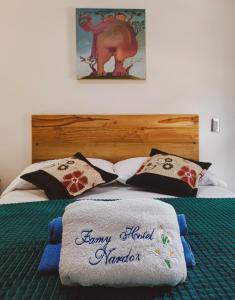 Postel nebo postele na pokoji v ubytování Famy Hostal Nardo's