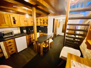 A kitchen or kitchenette at Appartement face Mont Blanc