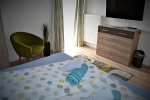 Postel nebo postele na pokoji v ubytování Appartement Thermenzeit