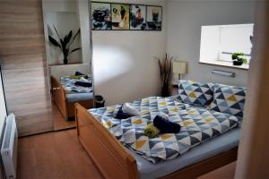 Postel nebo postele na pokoji v ubytování Appartement Thermenzeit