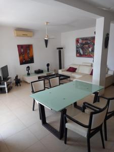 Coin salon dans l'établissement Appartement "AMINA" mit Pool