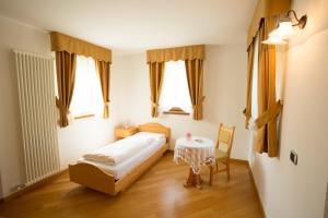 Posteľ alebo postele v izbe v ubytovaní Hotel Fior Di Bosco