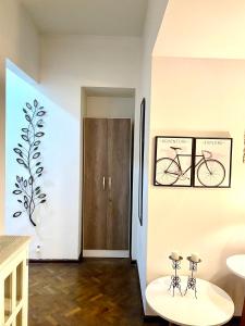 a living room with a bike on the wall at Mendoza R km 0 in Mendoza