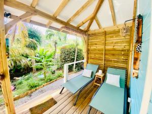 Giardino di Villa Gaïa - Bungalow Ti-Spa et son jacuzzi privé dans un jardin tropical, séjour en amoureux ou en famille
