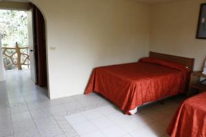 Voodi või voodid majutusasutuse Hotel Carrizal Spa toas