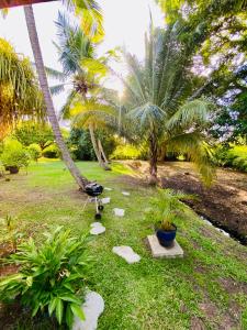 Giardino di Villa Gaïa - Bungalow Ti-Spa et son jacuzzi privé dans un jardin tropical, séjour en amoureux ou en famille