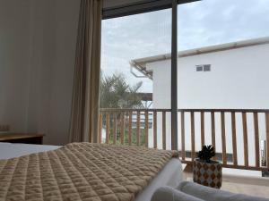 Voodi või voodid majutusasutuse Samana Hostal, Puerto Engabao toas
