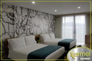 Letto o letti in una camera di Hotel Karmel