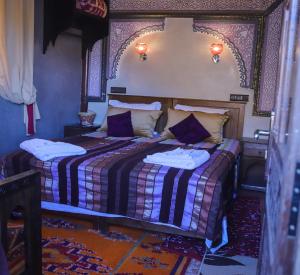 Voodi või voodid majutusasutuse Riad Atlas Panorama toas