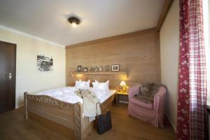 Postel nebo postele na pokoji v ubytování Gasthof-Hotel Dannerwirt