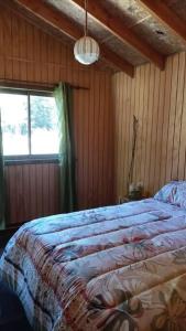 Katil atau katil-katil dalam bilik di Cabaña Los Chilcos