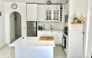 A kitchen or kitchenette at Sea View Penthouse with Large Terrace