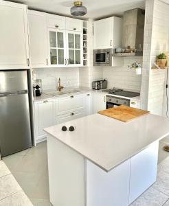 A kitchen or kitchenette at Sea View Penthouse with Large Terrace