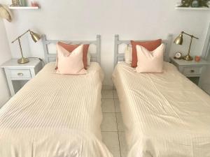A bed or beds in a room at Sea View Penthouse with Large Terrace