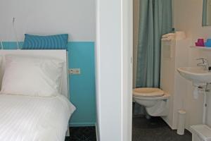 Ванная комната в Dorpslogement Pieterburen