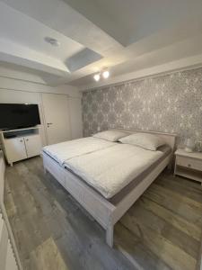 Postel nebo postele na pokoji v ubytování Apartment A6 Goslar am Marktplatz