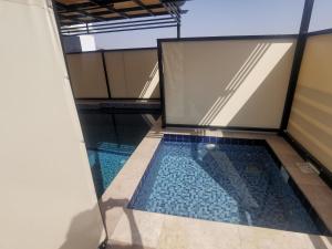 Bazén v ubytování Highness Villa Nizwa nebo v jeho okolí