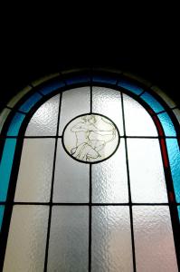 a stained glass window with a design on it at Crystal Plaza Hotel in Stockholm