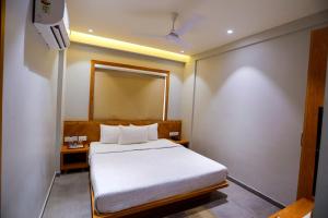 HOTEL OM客房内的一张或多张床位