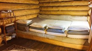 Letto o letti in una camera di Forest hut Stariy Prud