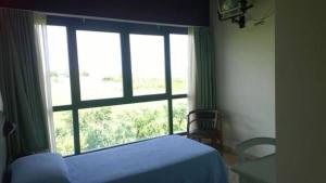 Voodi või voodid majutusasutuse Albergo del Po toas