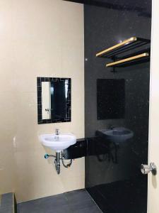 Koupelna v ubytování Alegria Hotel