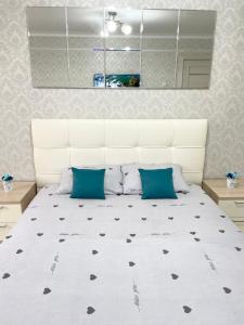 Postel nebo postele na pokoji v ubytování VIP квартира центр
