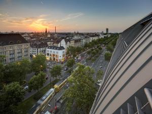 a view of a city with a train on a street at Breidenbacher Hof, Best Grandhotel 2025 - Die 101 Besten in Düsseldorf