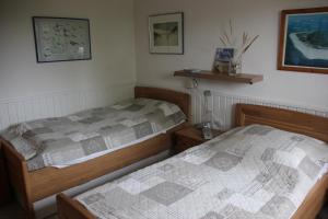 2 camas individuais num quarto com em Haus Seesand Wittdün em Wittdün