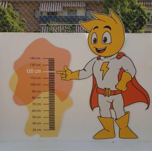 a sign of a superhero with a ruler at 30º Hotels - Hotel Pineda Splash in Pineda de Mar
