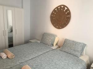 A bed or beds in a room at Canteras Home