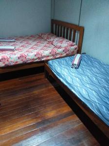 Postel nebo postele na pokoji v ubytování Discovery Youth Hostel Malacca