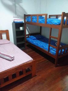 Postel nebo postele na pokoji v ubytování Discovery Youth Hostel Malacca