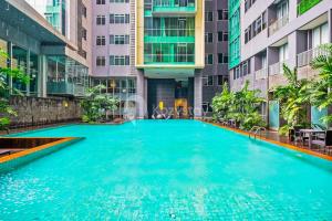 Swimmingpoolen hos eller tæt på Lily by Kozystay - Kuningan