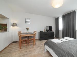 Posteľ alebo postele v izbe v ubytovaní Sliska 10 Apartament II + 6 fotografií