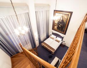 Posteľ alebo postele v izbe v ubytovaní Celestin Residence