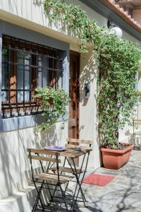 a wooden table sitting in front of a building at La Gabbia del Grillo in Florence