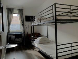 Postel nebo postele na pokoji v ubytování Solsta Hotell
