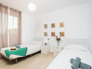 Postel nebo postele na pokoji v ubytování Apartment Manilva Hide Away 2