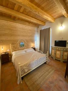 Posteľ alebo postele v izbe v ubytovaní Cascina Maina