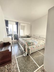 Posteľ alebo postele v izbe v ubytovaní Il nido sui caruggi
