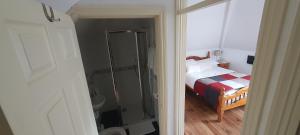 A bed or beds in a room at Lough Rynn View Accommodation Accommodation - Room only