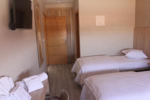 Voodi või voodid majutusasutuse HOTEL CAFE PALAIS SALAM , Beni Mellal toas
