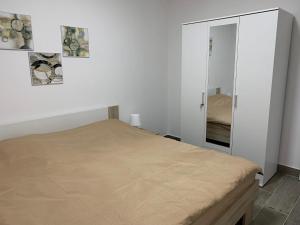 Postel nebo postele na pokoji v ubytování Apartman Diamond