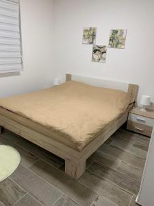 מיטה או מיטות בחדר ב-Apartman Diamond