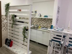 Kuchyň nebo kuchyňský kout v ubytování Apartman Diamond