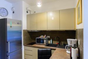 Kuchyňa alebo kuchynka v ubytovaní Apartamenty Via Marina