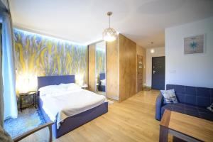 Posteľ alebo postele v izbe v ubytovaní Apartamenty Via Marina